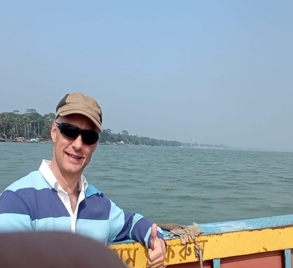 A tourist enjoying Barishal backwater tour in Bangladesh