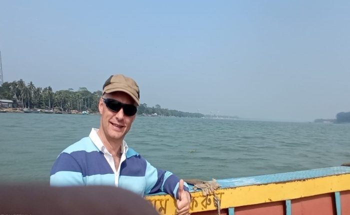 A tourist enjoying Barishal backwater tour in Bangladesh