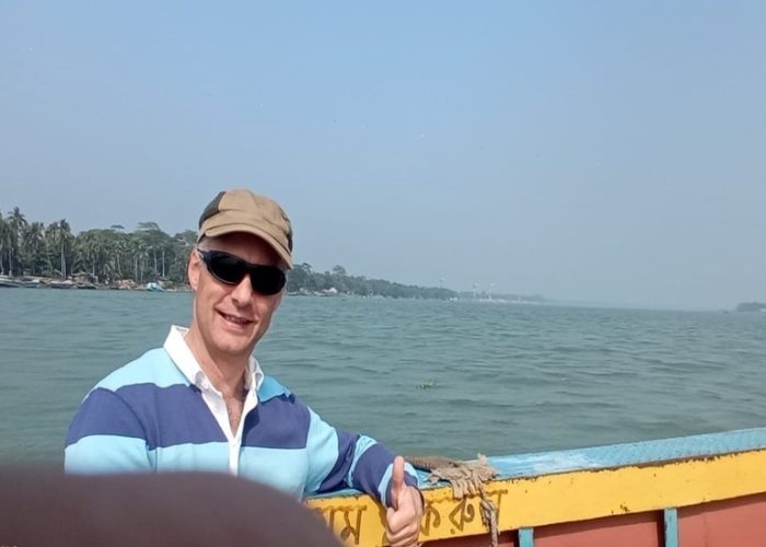 A tourist enjoying Barishal backwater tour in Bangladesh