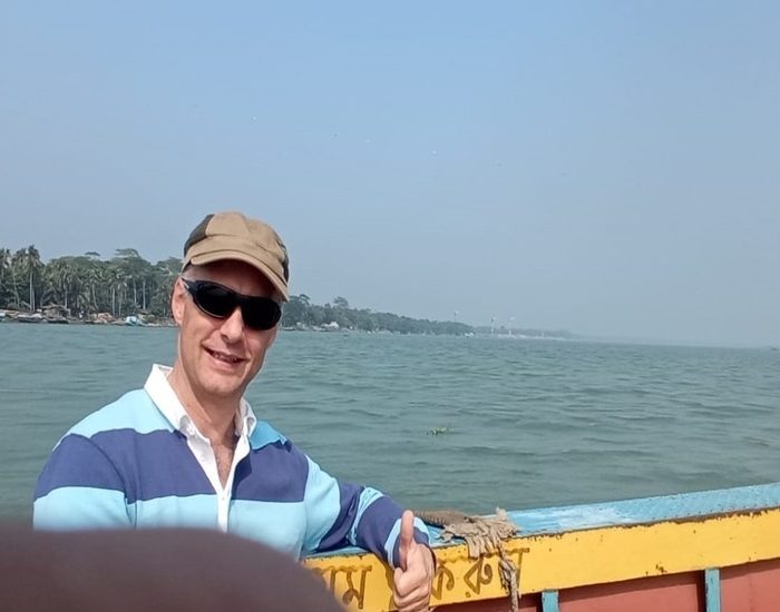 A tourist enjoying Barishal backwater tour in Bangladesh